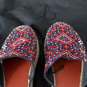 American eagle tribal slip ons